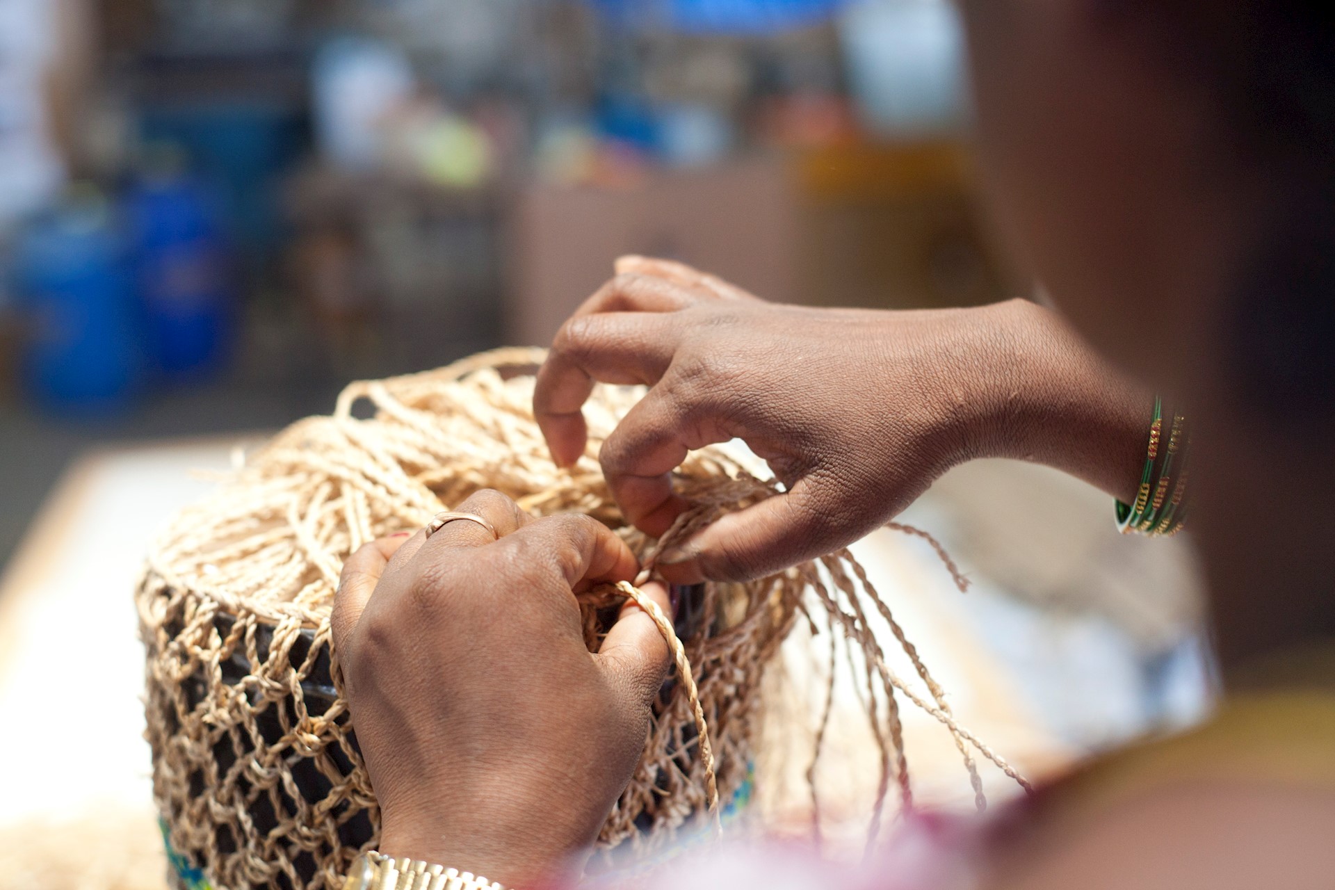Lady weaving, India 