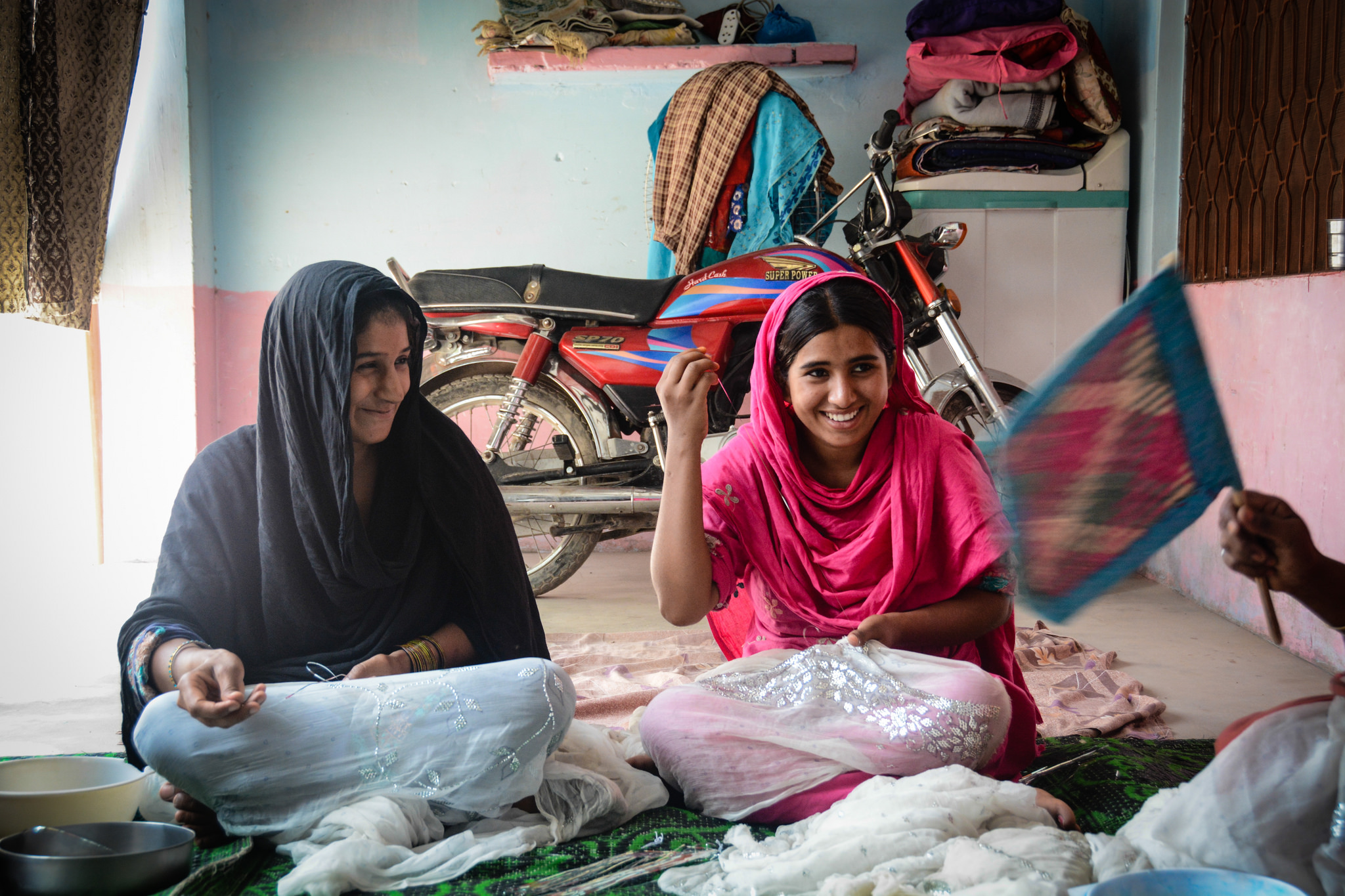 women sewing, Pakistan