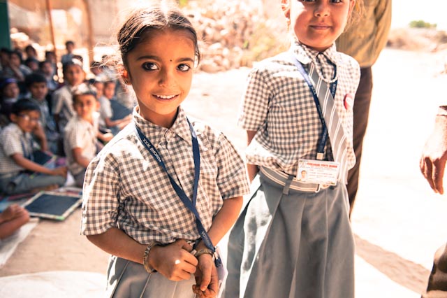 two young girls in school uniform, India 