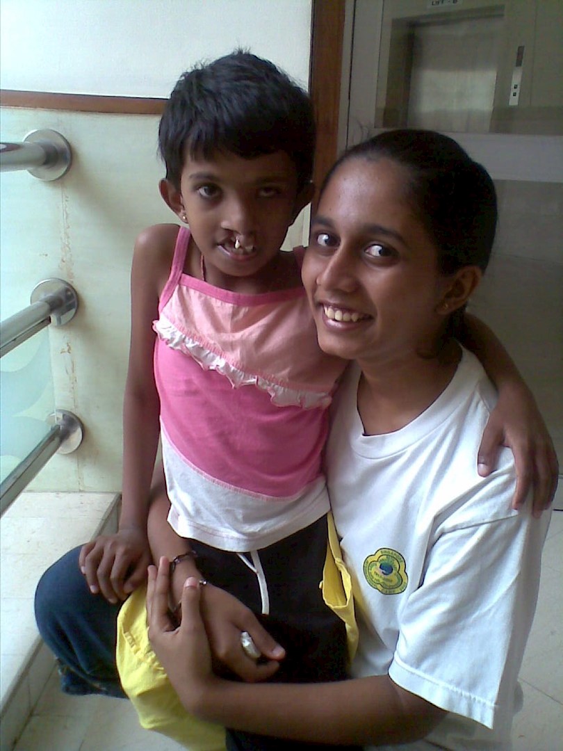 Lady holding a child 