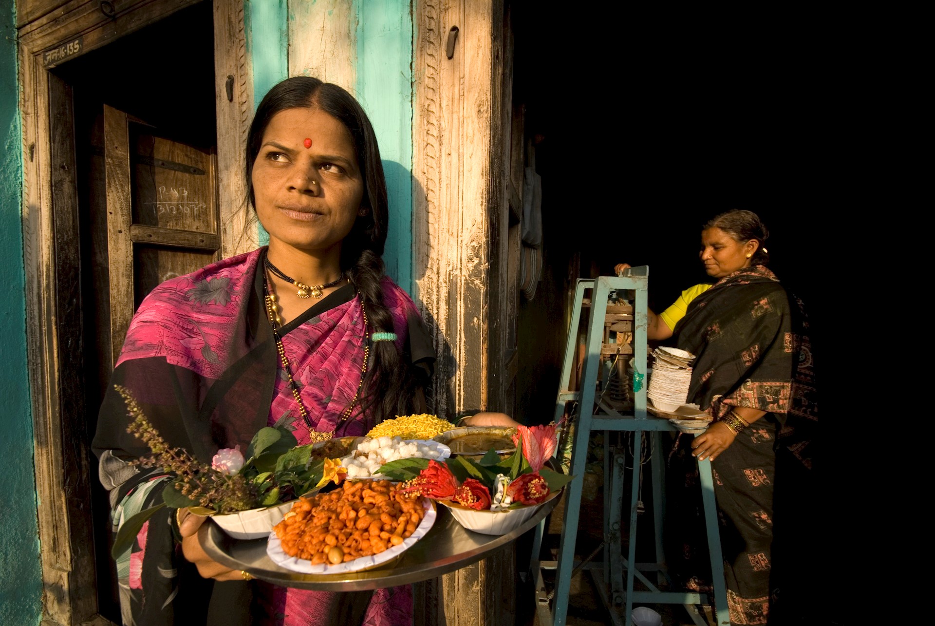 Woman holding food platter