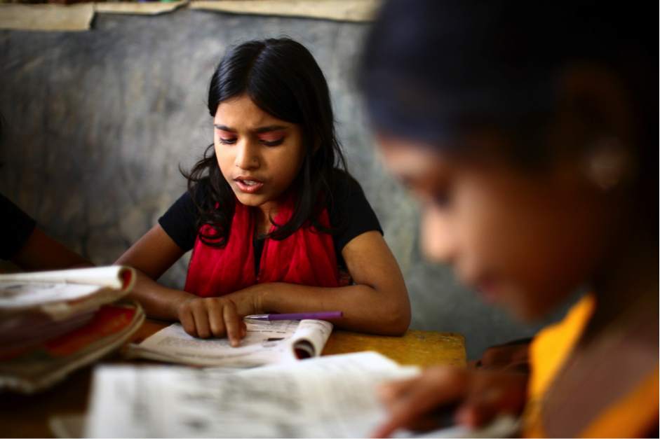 girl reading in class 